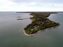 Titan of the grove, a modified version of gneiss of the old fields in act 2. Peninsula Point Lighthouse Upper Peninsula