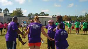 Just grab a hula hoop and you're ready to go! Hula Hoop Pass Relay Vystar Credit Union Facebook