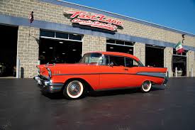 Image result for Orange Red 1957 Motorcycle