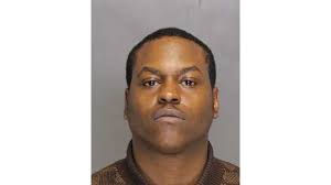 Man arrested in shooting at Foundry Row parking lot