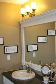 Brighten up your bathroom mirror with a gold frame against a white wall. Full Of Great Ideas How To Upgrade Your Builder Grade Mirror Frame It Home Decor Home Home Diy