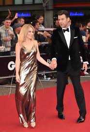 Kylie minogue has never exactly tripped off the tongue. Kylie Minogue Looks Smitten As She Makes Red Carpet Debut With Boyfriend Paul Solomons
