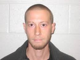 Two fugitives accused of breaking into homes