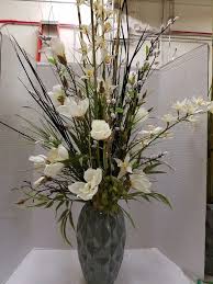 We did not find results for: Natural White Magnolias And Dendrobium Orchids With Bear Grass Very Tall And Showy Flower Vase Arrangements Flower Arrangements Simple Floral Arrangements Diy