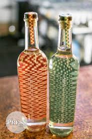 Two species of agave are used to produce this mezcal: Mezcal Derrumbes Home Facebook