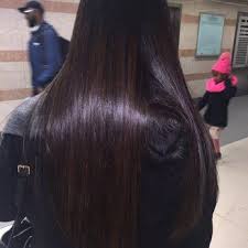 If purple red hair feels like it's a bit too far out of your comfort zone, just try a darker plum shade that's closer to your current hue, so that the contrast isn't so overwhelming. Dark Brunette Hair With Subtle Purple Tint Dark Brunette Hair Hair Subtle Hair Color