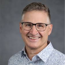 Doug Gaumer, our Market President in Kansas, has been named an Honorary  Chairman of the Newhouse Imagine a Day Gala. Doug, pictured fourth from the  right, is one of 11 Kansas City