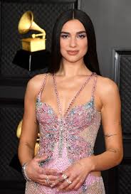 Dua lipa is an english singer, songwriter, and model. Dua Lipa In Versace Gown At The 2021 Grammys Red Carpet World Fashion Channel