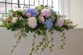 Window Sill Floral Arrangement By Eden Blooms Florist Lilac And Pale Pink Hydrangea Sweet Avalanche Avala Hydrangeas Wedding Ceremony Flowers Blooms Florist