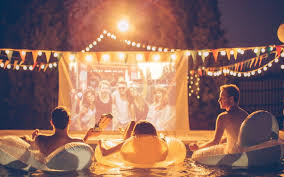 Have A Blast Summer Pool Party Ideas Backyard Pool Parties Backyard Movie Nights Backyard Movie Night Party
