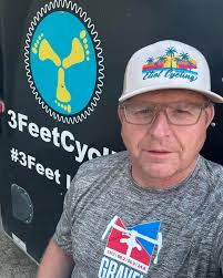 Todd Burk rolling thru mile 58 miles with a good group and looking good.