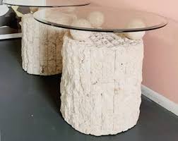 This sculptural coffee table pairs an airy, open base with a stone surface, creating an unexpected, inverted silhouette. Stone Coffee Table Etsy