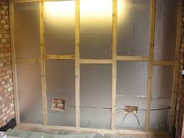 Placing sheets of wood on the wall will allow the shelves and hooks to be secure without needing to be drilled into studs directly. Will S Garage Layout Layout Topics Rmweb