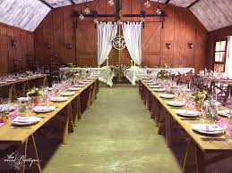 Timber Trestle Tables Styled For A Wedding Reception In The Barn At Harpers Homestead Nzwedding Nzwed Floral Arrangements Wedding Table Style Wedding Styles