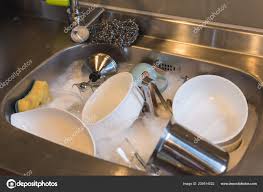 dirty dishes kitchen sink water home