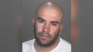 Armed parolee leads officers