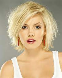 Whether your hair is naturally wavy or done so with a curling iron, these short cuts will look great with soft beds. Elisha Cuthbert Thick Hair Styles Shaggy Short Hair Hair Styles