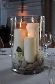 Large Hurricane Vase With Candles Rocks And Gardenias Centerpiece Bjl Candle Decor Garden Candles Candle Arrangements