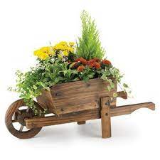 Freeport Park Milton 4 Piece Plastic Self Watering Wall Planter Set Small Flower Pots Spring Garden Decor Wheelbarrow Planter