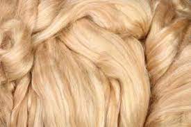 The yak is a chocolate brown, when blended with the silk, appears a taupe color and the baby camel blend shimmers like gold. Camel Silk Wollinchen