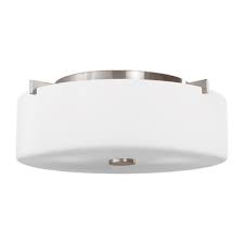 If your new light fixture doesn't match your old mount type, you'll have to remove the bracket from the junction box and change the screws. Ceiling Flush Mount By Sea Gull Lighting