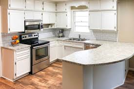 Avoid getting brush marks on the flatter and smoother areas. Tips For Refinishing Kitchen Cabinets This Old House