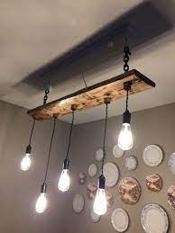 We'll review the issue and make a decision about a partial or a full refund. Just Finished This Rustic Ceiling Light For My Daughter S Dining Area The Wood Was Harvested From The Map Rustic Ceiling Lights Rustic Lighting Ceiling Lights