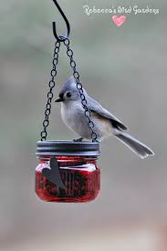 Bird Feeders For Small Birds Diy Feeder Small Red Jars Target Mason Jar Hanger Michaels Add A Decorative Accent Bir Mason Jar Bird Feeders Homemade Bird Feeders Humming Bird Feeders