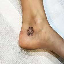 Black Little Om Hamsa Tattoo On Ankle Foot Tattoos Hamsa Hand Tattoo Hamsa Tattoo