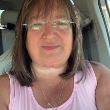 What are some good park and stay options with shuttle service near Port  Canaveral?