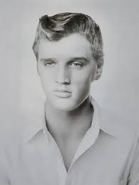 Right around 1981 or so (can't remember exactly) my family visited  Graceland. I remember there was a garden area around Elvis's grave. I don't  know why, but I felt compelled to pluck