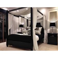 This poster bed is turning heads with its clean, streamlined vibe. A Four Poster Bed To Add Elegance King Size Bedroom Sets Atmosphere Ideas Modern Black White Metal Painted Oak Silver Twin Apppie Org