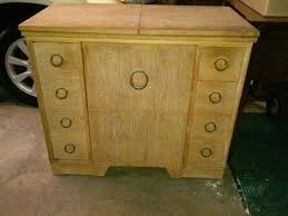 Sewing Machine Cabinet With Hidden Chair Antique Sewing Machines Vintage Sewing Machines Sewing Machine