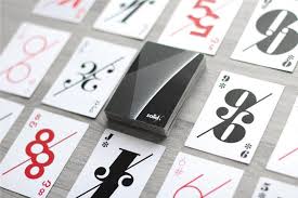 Layered paper is produced by putting a number of sheets of paper in a stack and gluing them together. Ultra Modern Playing Cards Playing Cards Design Playing Cards Playing Cards Art