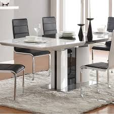 Anchor The Dining Room In Effortless Style With This Essential Table Perfect For Weekday Contemporary Dining Table Modern Dining Room Modern Dining Table Set