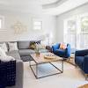 This classic living room looks fascinating with its huge comfortable seating and puffy pillows. 1