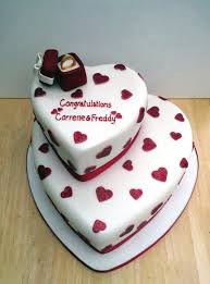 We don't think you can beat the classic red velvet and cream cheese combo. Red Velvet Engagement Cake Giftyleaf
