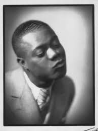 “LOUIS ARMSTRONG'S BLACK AND BLUES”