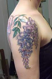 Wisteria Tattoo By Esther Garcia Very Well Done Original Yet Simple I Like Lilac Tattoo Body Tattoos Beautiful Tattoos