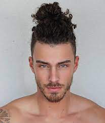 15 Best Man Bun Undercut Hairstyles Men S Hairstyle Tips Curly Hair Men Long Curly Hair Men Professional Hairstyles For Men