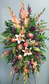 Standing Spray In Fall Colors With A Feminine Touch Bloomwithjenna Sympathyflowers Funeralflow Funeral Flower Arrangements Funeral Flowers Cemetery Flowers