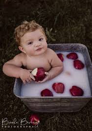A breast milk bath recipe requires warm water, 180 to 300 ml of breast milk and a baby bathtub. Apple Milk Bath Fall Milestone Session Milk Bath Baby Photoshoot Girl Baby Photoshoot