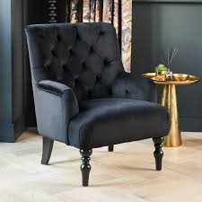 One of the most sought after and comfortable attributes of furniture are armchairs. Chatsworth Black Velvet Button Upholstered Armchair The Furniture Market