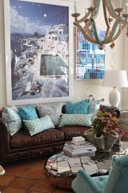 A brown leather sofa is like a favorite pair of jeans. Colors Of The Sea Abount At Palmbeach Mecox Interiordesign Mecoxgardens Furni Leather Sofa Living Room Decor Living Room Leather Living Room Design Brown