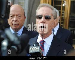 New York Mets' owners Fred Wilpon, right, and Saul Katz talk to the media  in front of federal court in New York, Monday, March 19, 2012. The New York  Mets owners and