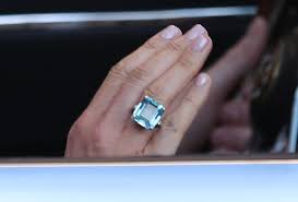 There's not a lot more anticipated than the wedding dress when it comes to a royal wedding. Meghan Markle Wears Princess Diana S Aquamarine Ring And A Halterneck Stella Mccartney Dress For Frogmore House Evening Reception