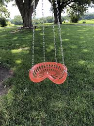 created a great swing from an old tractor seat tractor seats decor tractor decor tractor seats