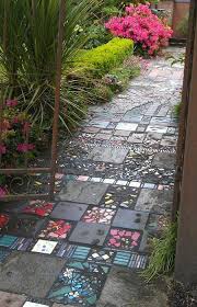 I cannot believe that this paver walkway was not a work of a professional. 10 Diy Garden Paths Made From Upcycled Finds Cottage Life Diy Garden Path Diy Garden Projects Garden Paths