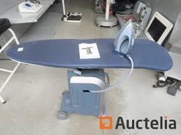 Prévoyez, pour plus de commodité, une table à repasser pour poser la centrale vapeur. Table A Repasser Philips Avec Centrale Vapeur