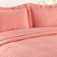 They add style to any bedroom and comfort to any mattress. Laura Ashley Solid Coral Quilt Set From Beddingstyle Com